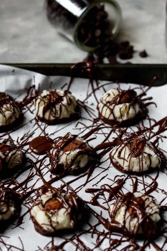 No bale almond joy cookies on a tray with chocolate
