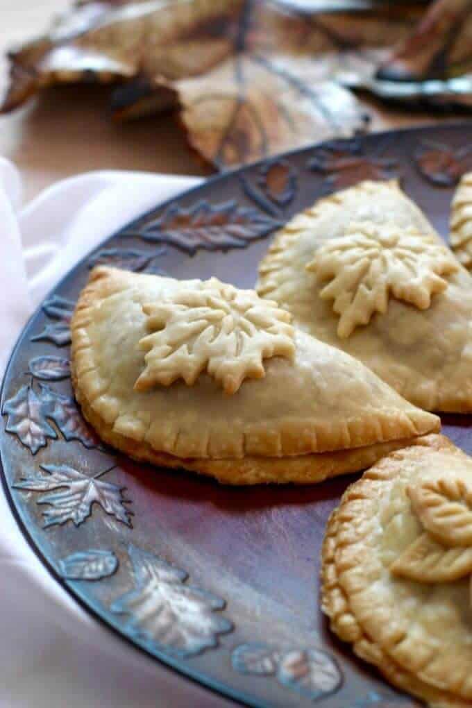 Turkey empanadas on a leaf plate - leftover turkey recipes