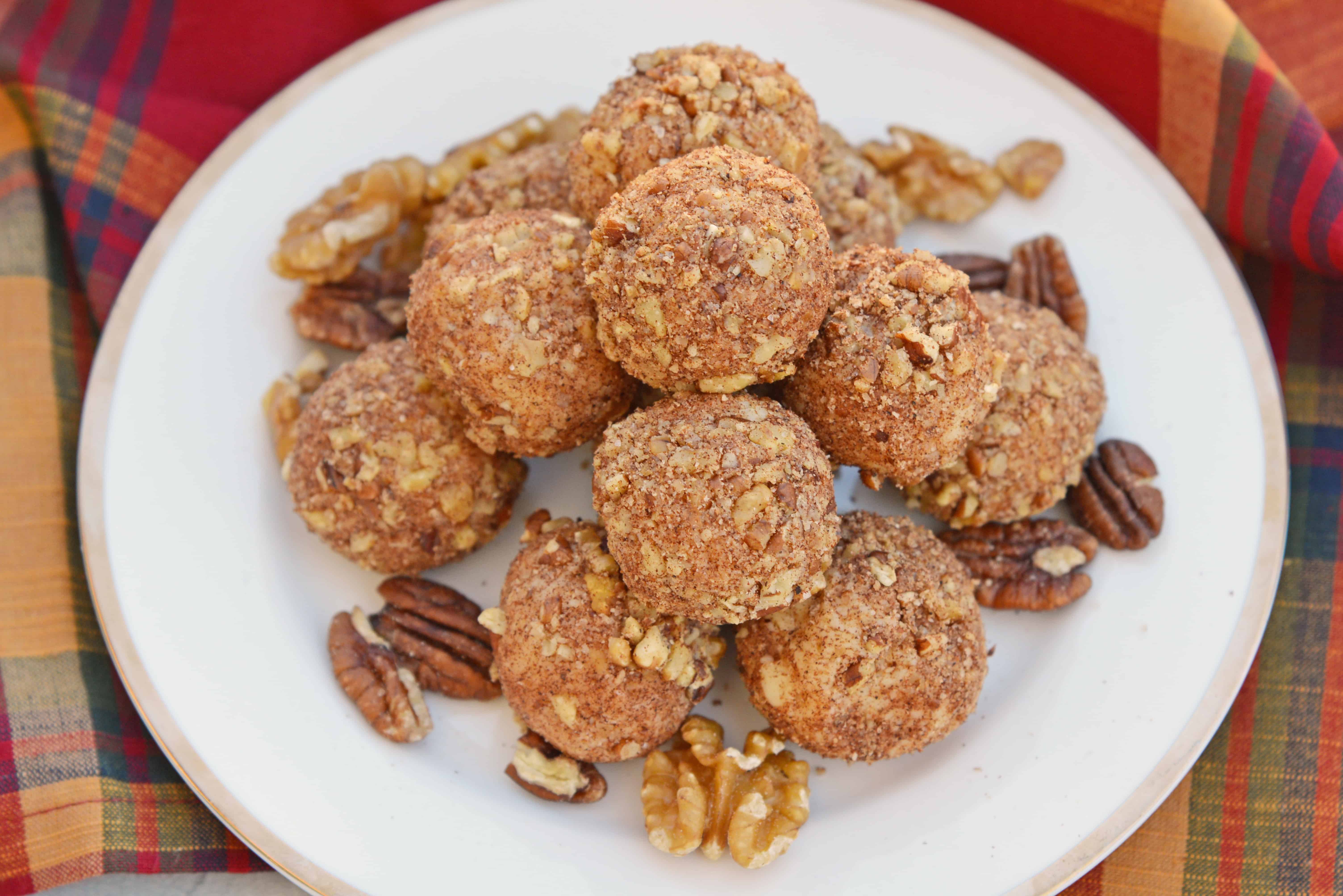White Chocolate Truffles are an easy truffle recipe made with just a handful of ingredients. Creamy white chocolate rolled in toasted pecans, cinnamon and nutmeg. #whitechocolatetruffles #easytrufflerecipe www.savoryexperiments.com