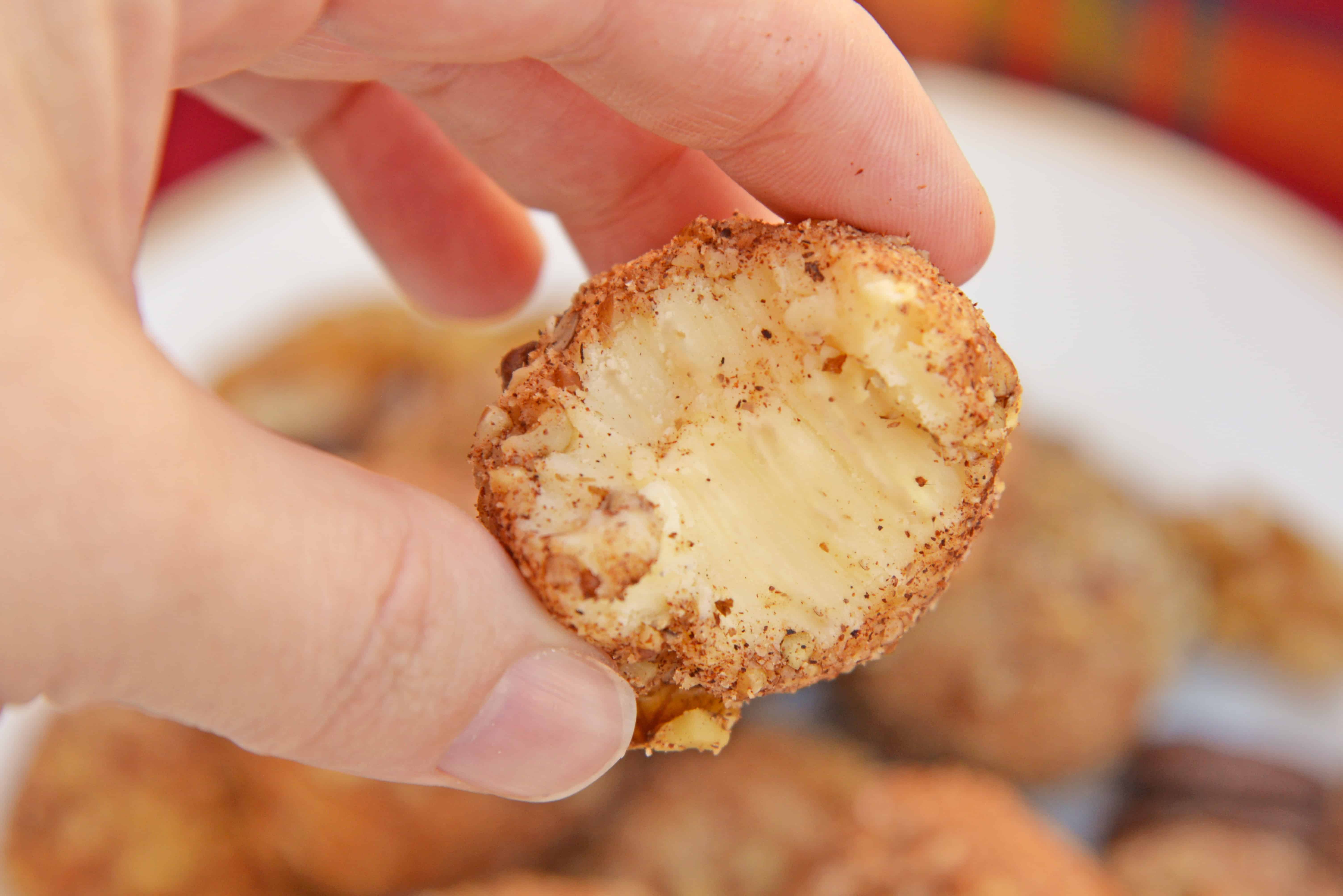 White Chocolate Truffles are an easy truffle recipe made with just a handful of ingredients. Creamy white chocolate rolled in toasted pecans, cinnamon and nutmeg. #whitechocolatetruffles #easytrufflerecipe www.savoryexperiments.com 