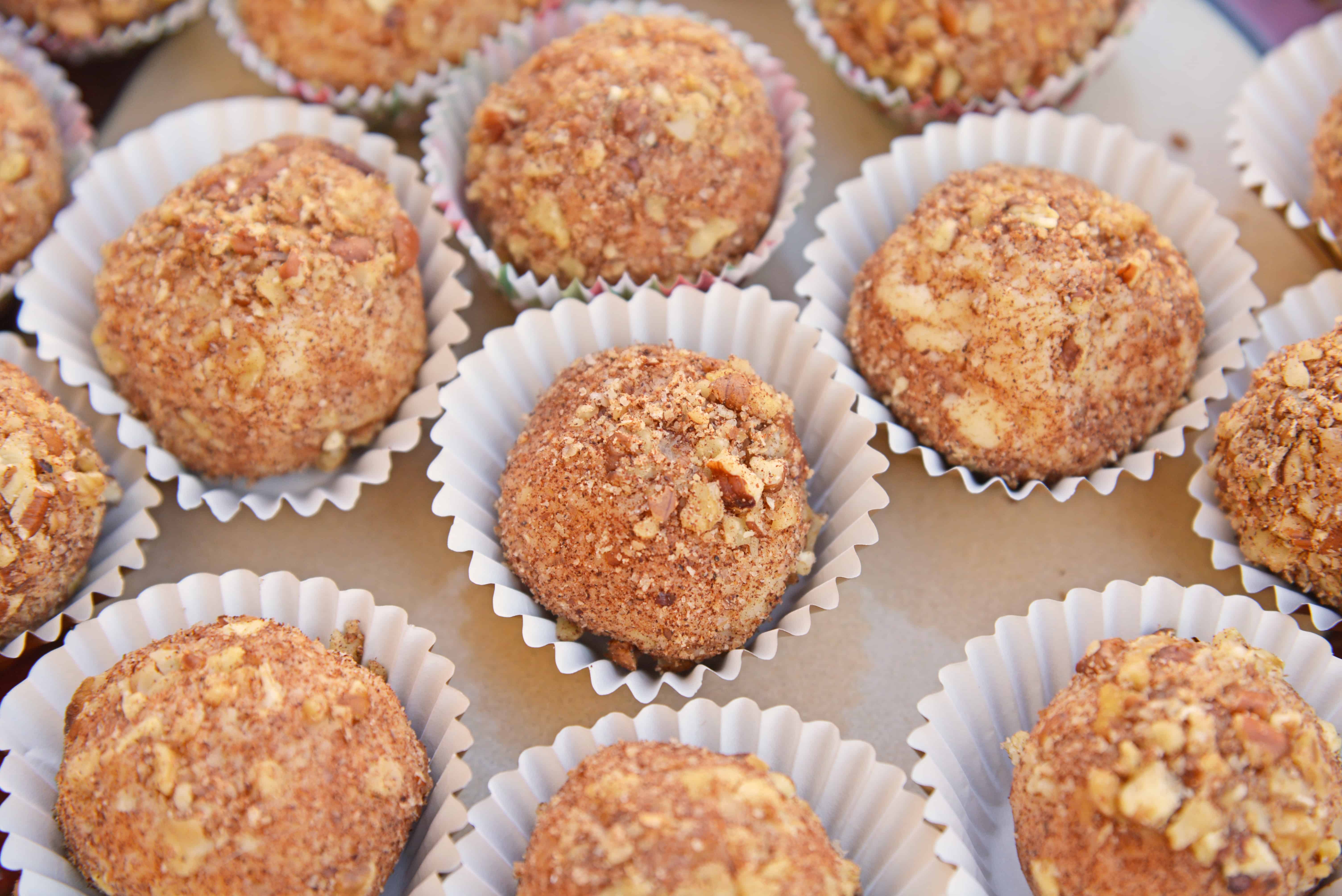 White Chocolate Truffles are an easy truffle recipe made with just a handful of ingredients. Creamy white chocolate rolled in toasted pecans, cinnamon and nutmeg. #whitechocolatetruffles #easytrufflerecipe www.savoryexperiments.com 