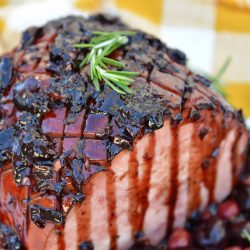 Balsamic Cherry Ham Glaze is an easy ham glaze for your Christmas ham or any baked ham throughout the year. Tart cherries, balsamic vinegar and brown sugar lend bold flavors. #hamglaze #christmasham #hamrecipe www.savoryexperiments.com