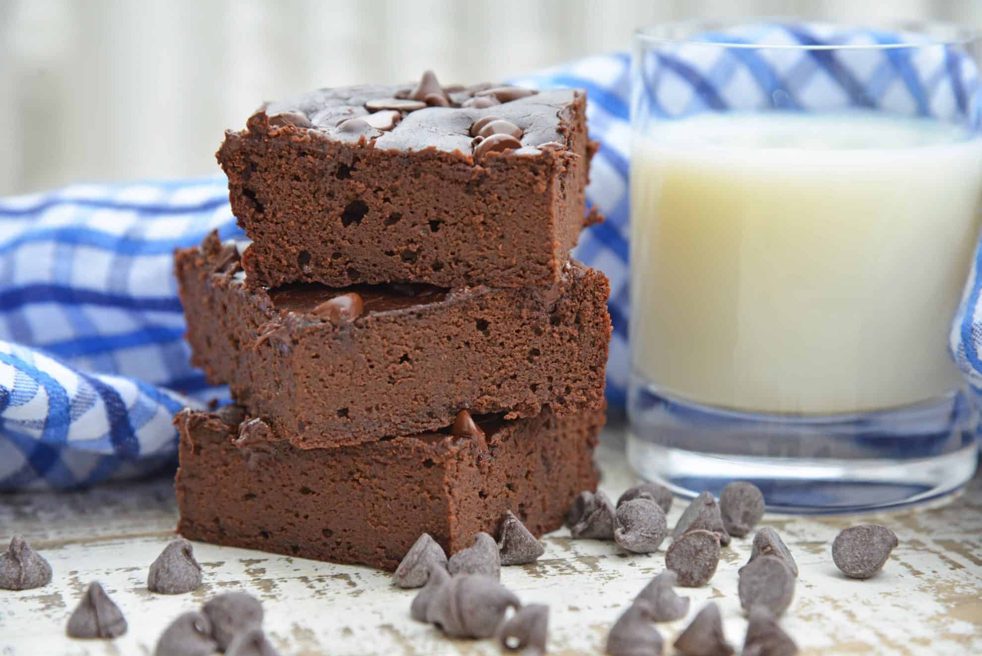 Flourless Black Bean Brownies are a delicious, fudgy gluten free brownie recipe. Healthy brownie recipes have never tasted this good! #glutenfreebrownies #homemadebrownies #flourlessbrownies #blackbeanbrownies www.savoryexperiments.com 