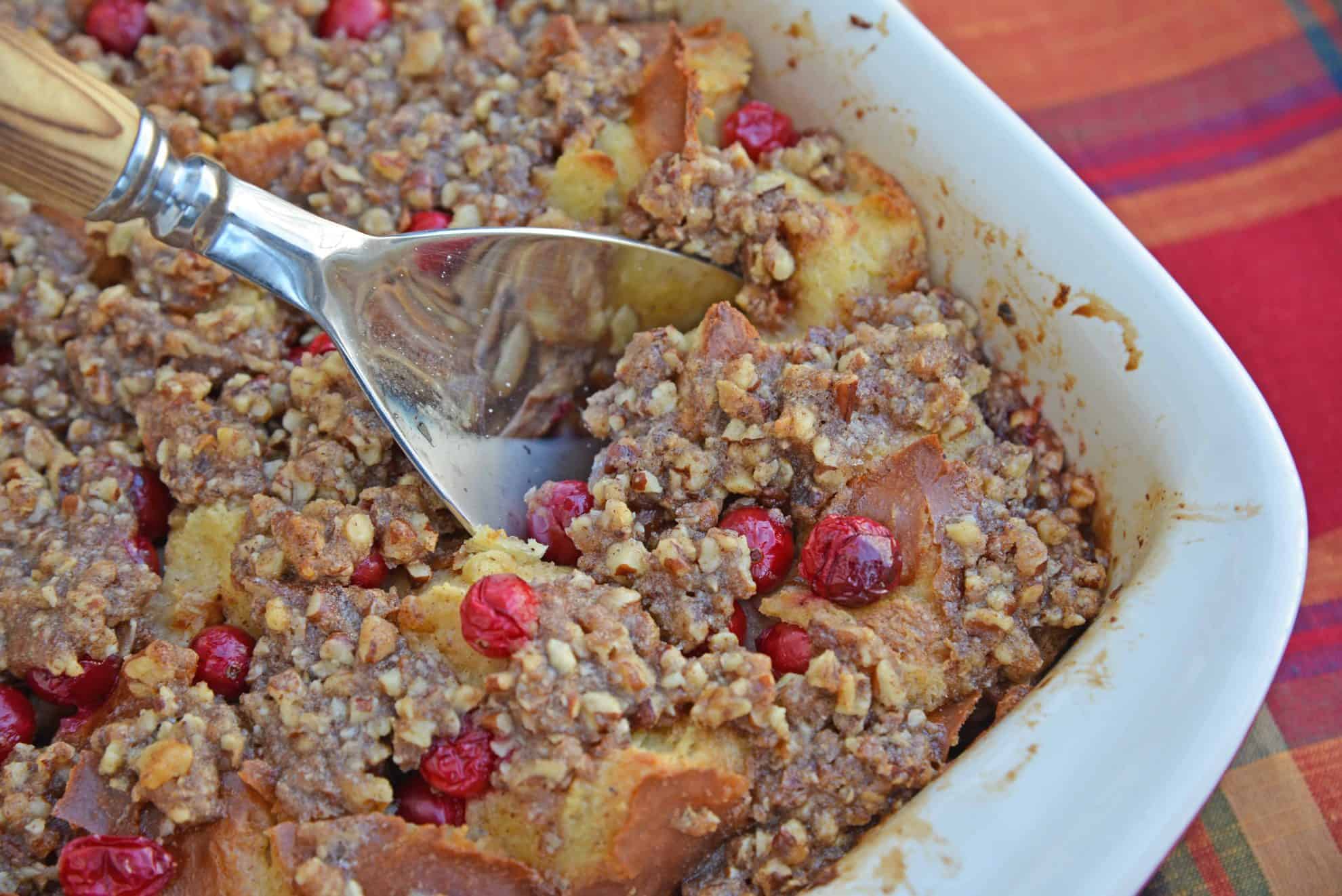 Cranberry French Toast Casserole is one of the best recipes using cranberries you'll ever make! A French toast casserole perfect for Christmas breakfast! #frenchtoastcasserole #christmasbreakfast #recipesthatusecranberries www.savoryexperiments.com
