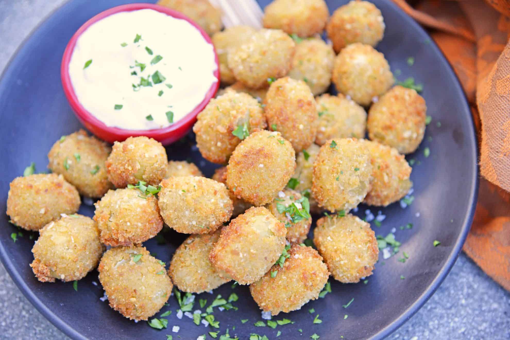 Fried Blue Cheese Stuffed Olives will become your favorite New Year's Eve recipe. But, this easy appetizer recipe is perfect for all occasions! #newyearseverecipes #easyappetizerrecipes #oliverecipes www.savoryexperiments.com