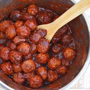 These Cranberry Chili Meatballs, made with only 4 ingredients, will become your go-to cocktail meatballs recipe! The perfect appetizer for any gathering! #partymeatballs #instantpotmeatballs #cocktailmeatballs www.savoryexperiments.com