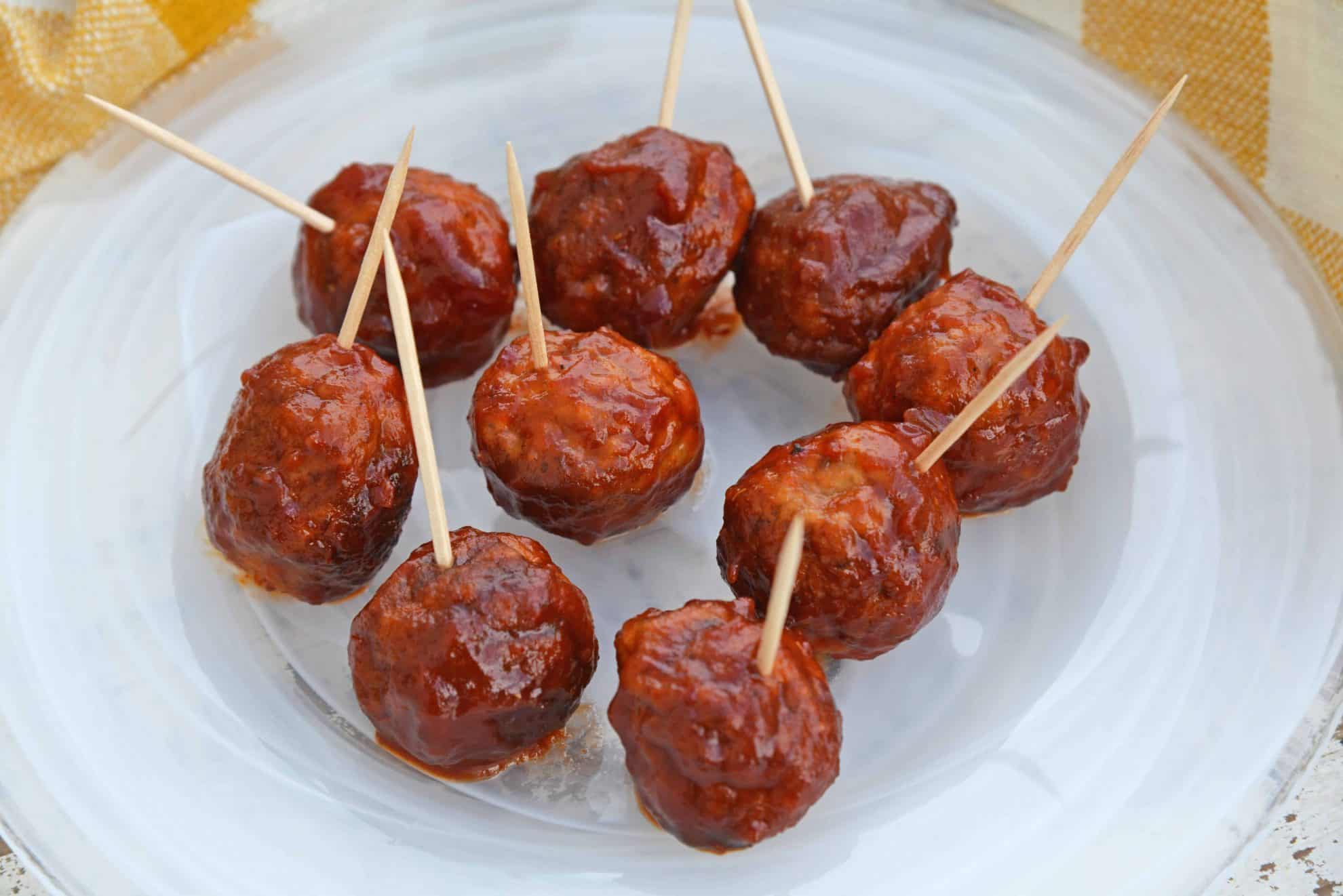 These Cranberry Chili Meatballs, made with only 4 ingredients, will become your go-to cocktail meatballs recipe! The perfect appetizer for any gathering! #partymeatballs #instantpotmeatballs #cocktailmeatballs www.savoryexperiments.com