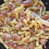 This delicious One-Pan Sausage Alfredo Pasta is an easy weeknight meal with instructions on how to make homemade alfredo sauce. So simple and good! #alfredosauce #alfredopasta www.savoryexperiments.com