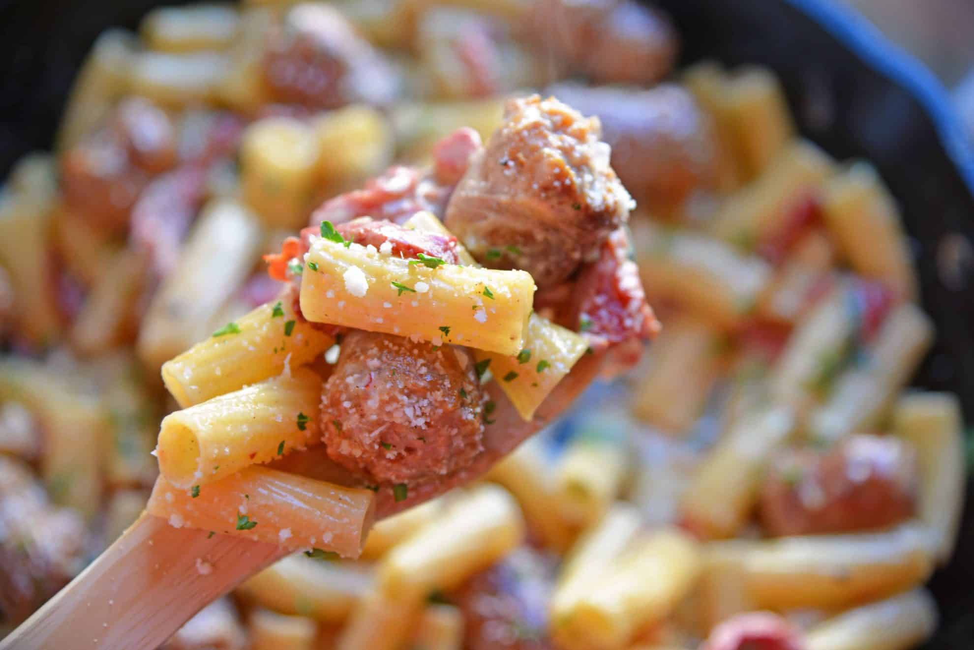 This delicious One-Pan Sausage Alfredo Pasta is an easy weeknight meal with instructions on how to make homemade alfredo sauce. So simple and good! #alfredosauce #alfredopasta www.savoryexperiments.com 