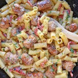 This delicious One-Pan Sausage Alfredo Pasta is an easy weeknight meal with instructions on how to make homemade alfredo sauce. So simple and good! #alfredosauce #alfredopasta www.savoryexperiments.com