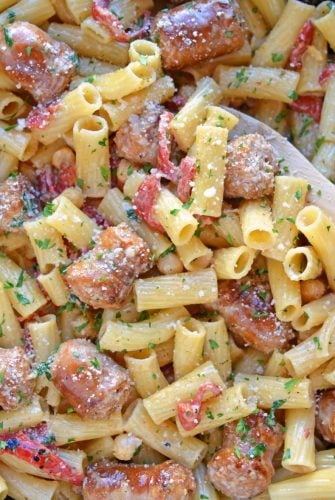 This delicious One-Pan Sausage Alfredo Pasta is an easy weeknight meal with instructions on how to make homemade alfredo sauce. So simple and good! #alfredosauce #alfredopasta www.savoryexperiments.com