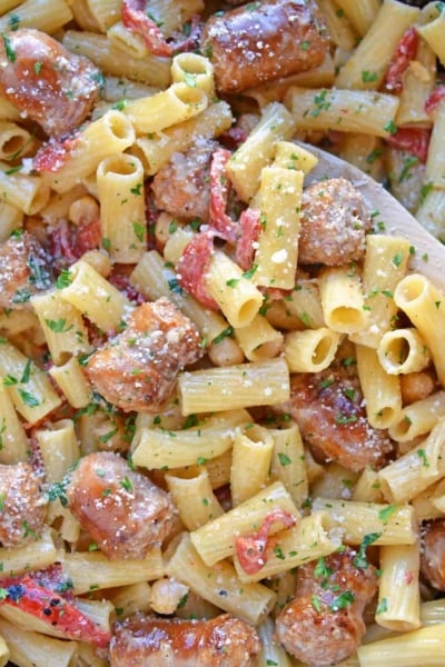 This delicious One-Pan Sausage Alfredo Pasta is an easy weeknight meal with instructions on how to make homemade alfredo sauce. So simple and good! #alfredosauce #alfredopasta www.savoryexperiments.com