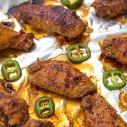 chicken wings on a baking sheet