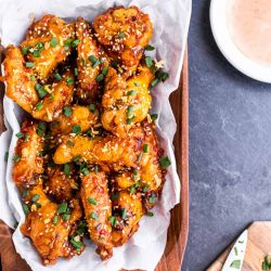 firecracker chicken wings on a platter