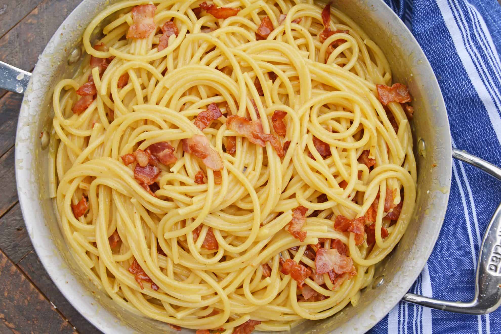Authentic Carbonara is an easy Italian pasta recipe using eggs, cheese and bacon. This is an easy carbonara recipe that any home cook can feel confident in making! #easycarbonara #spaghetticarbonara #authenticcarbonara www.savoryexperiments.com