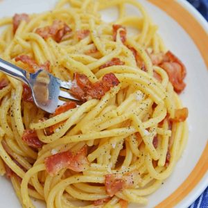 Authentic Carbonara twirled on a fork