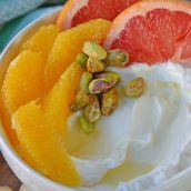 A bowl of  yogurt with citrus