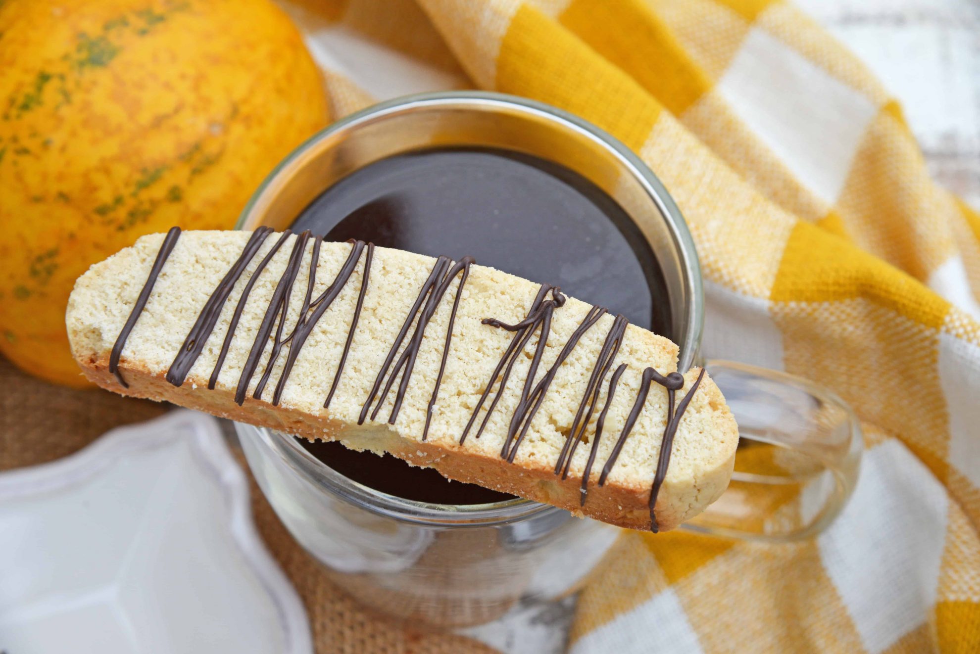 Vanilla Mocha Biscotti are easy to make and perfect for pairing with coffee or tea. Subtle coffee, vanilla and chocolate flavors make them suitable for any occasion. #homemadebiscotti #biscottirecipe www.savoryexperiments.com