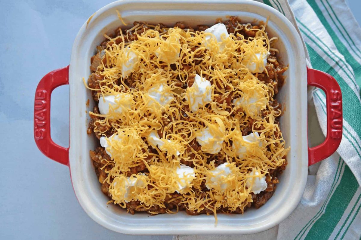 overhead shot of unbaked sloppy joe tater tot casserole