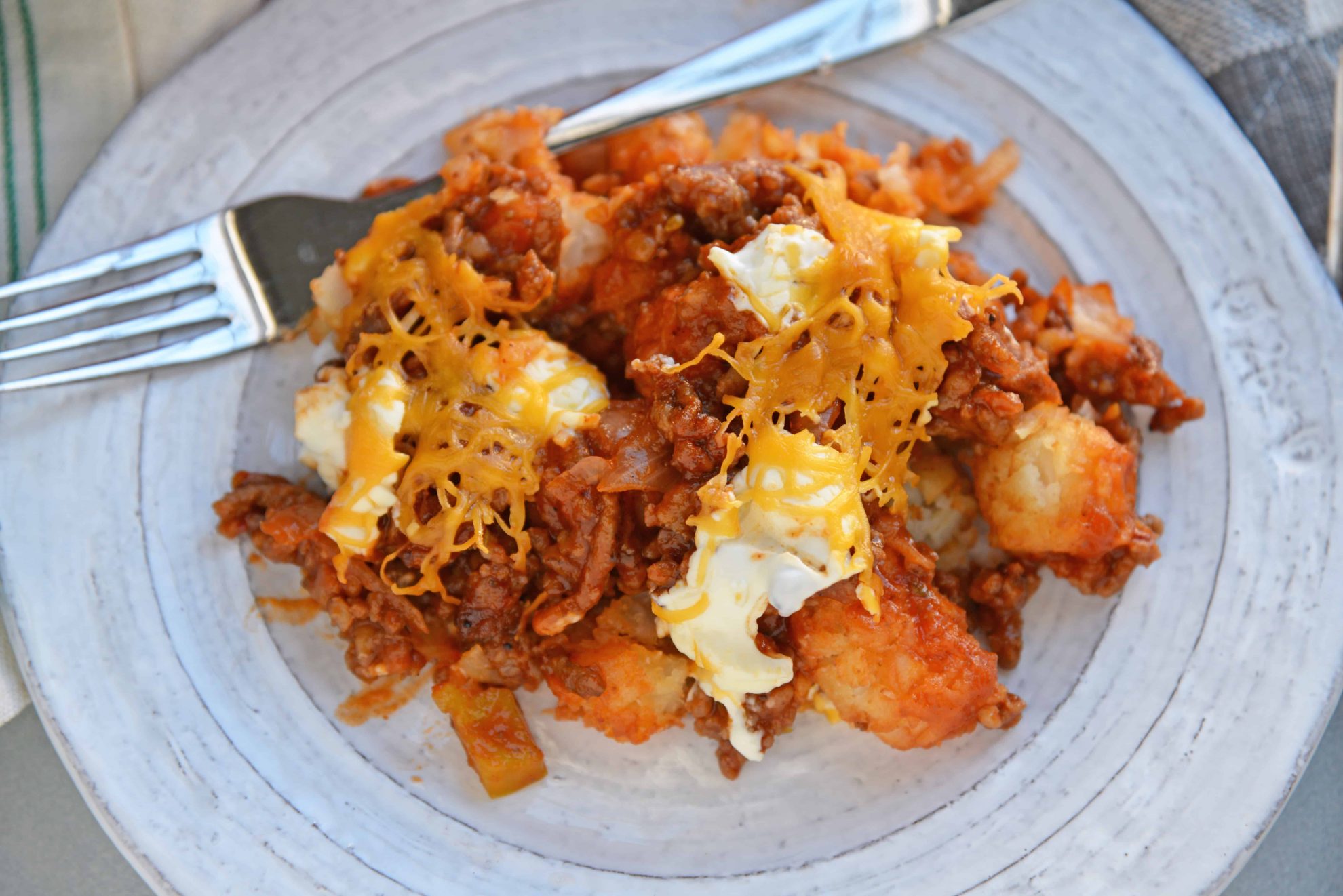 overhead shot of plate of sloppy joe tater tot casserole