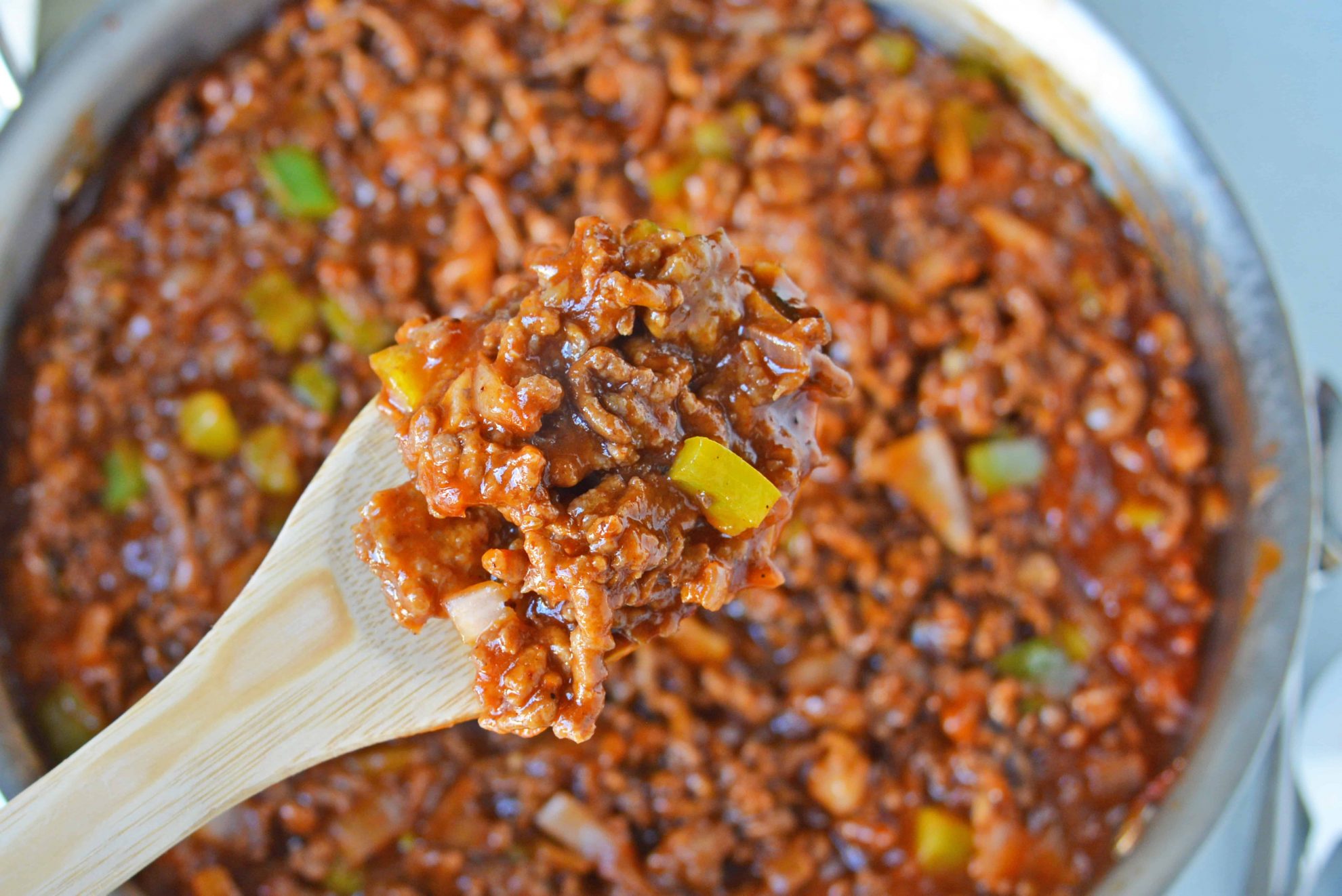 Homemade Sloppy Joes are so easy to make! Use my special sweet heat sloppy Joe sauce recipe with ground pork, beef, chicken or even turkey! #homemadesloppyjoes #sloppyjoesauce #sloppyjoerecipe www.savoryexperiments.com 