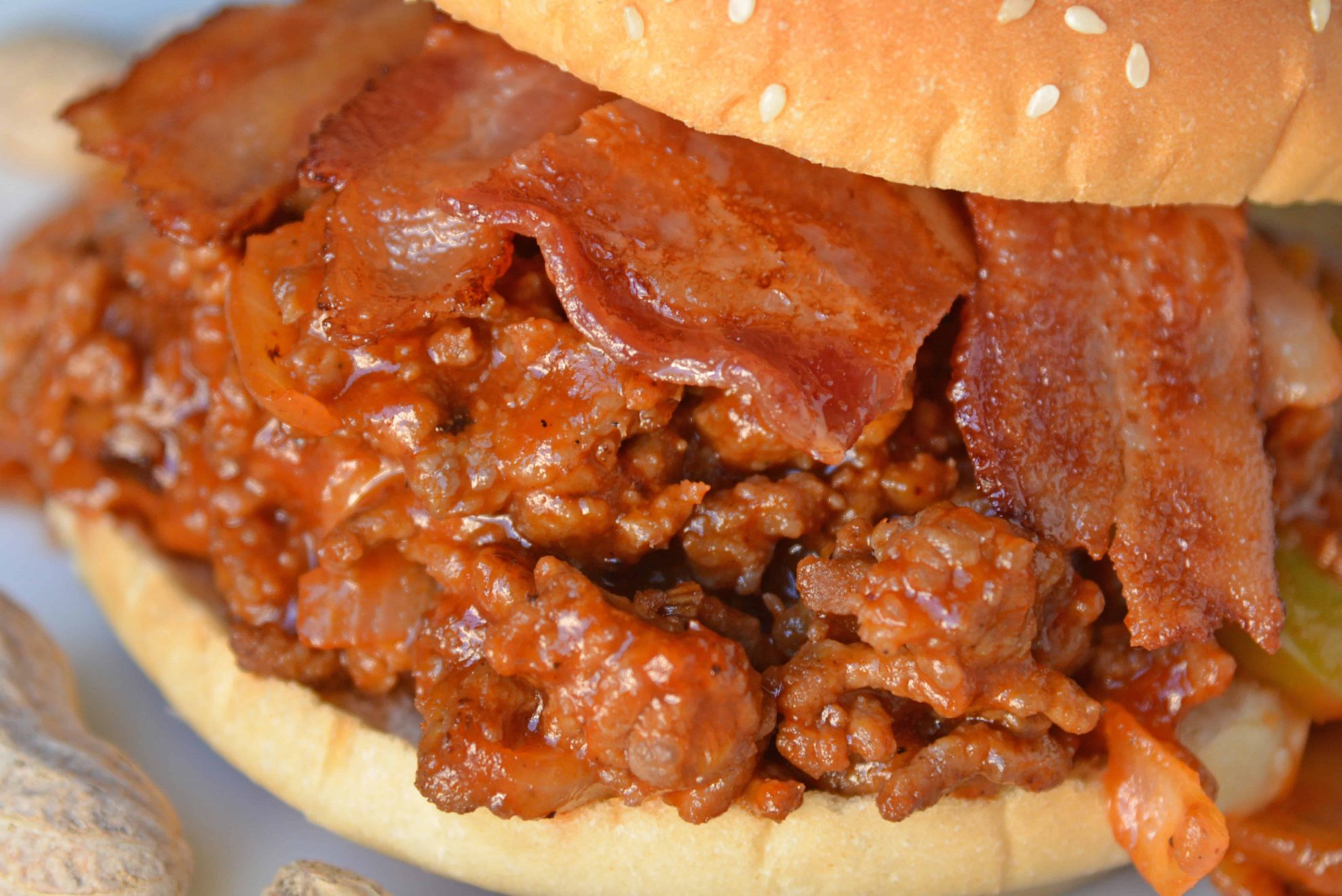 Homemade Sloppy Joes are so easy to make! Use my special sweet heat sloppy Joe sauce recipe with ground pork, beef, chicken or even turkey! #homemadesloppyjoes #sloppyjoesauce #sloppyjoerecipe www.savoryexperiments.com 