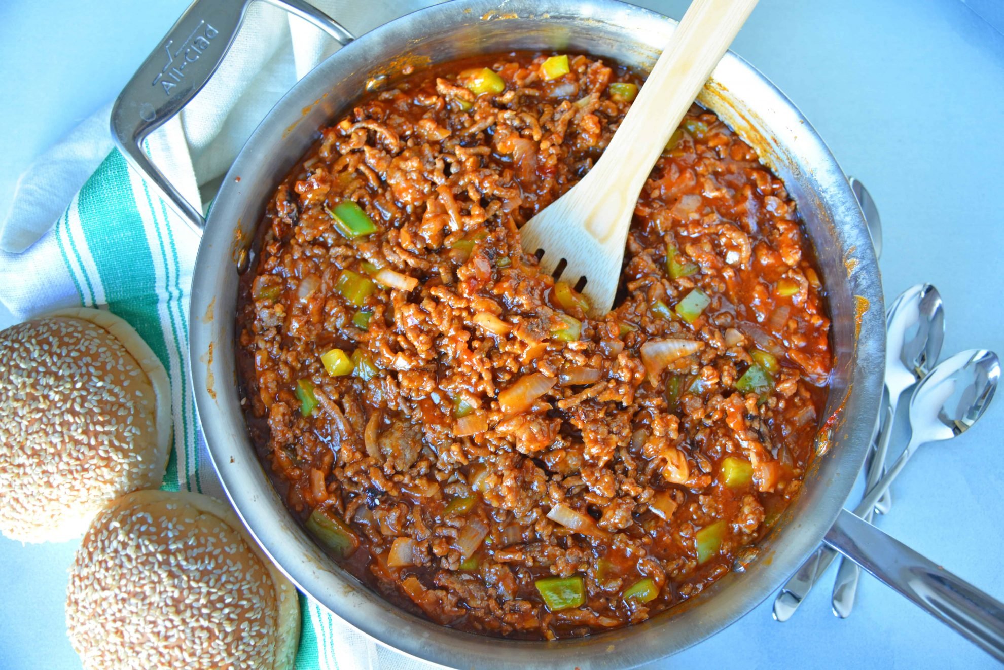 Homemade Sloppy Joes are so easy to make! Use my special sweet heat sloppy Joe sauce recipe with ground pork, beef, chicken or even turkey! #homemadesloppyjoes #sloppyjoesauce #sloppyjoerecipe www.savoryexperiments.com 