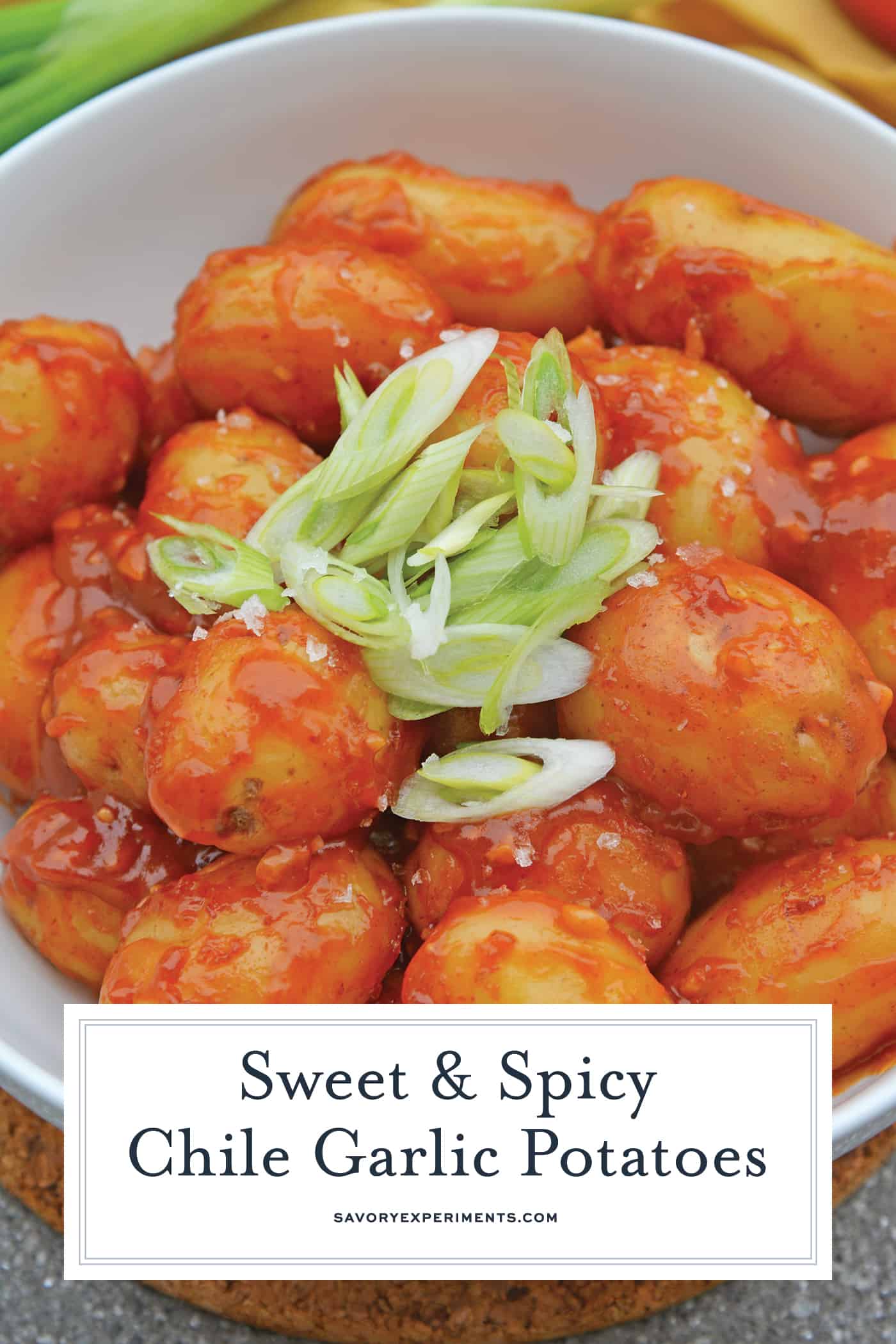 Chile Garlic Potatoes are an easy potato side dish using baby potatoes in a sweet and spicy sauce. #potatosidedish www.savoryexperiments.com