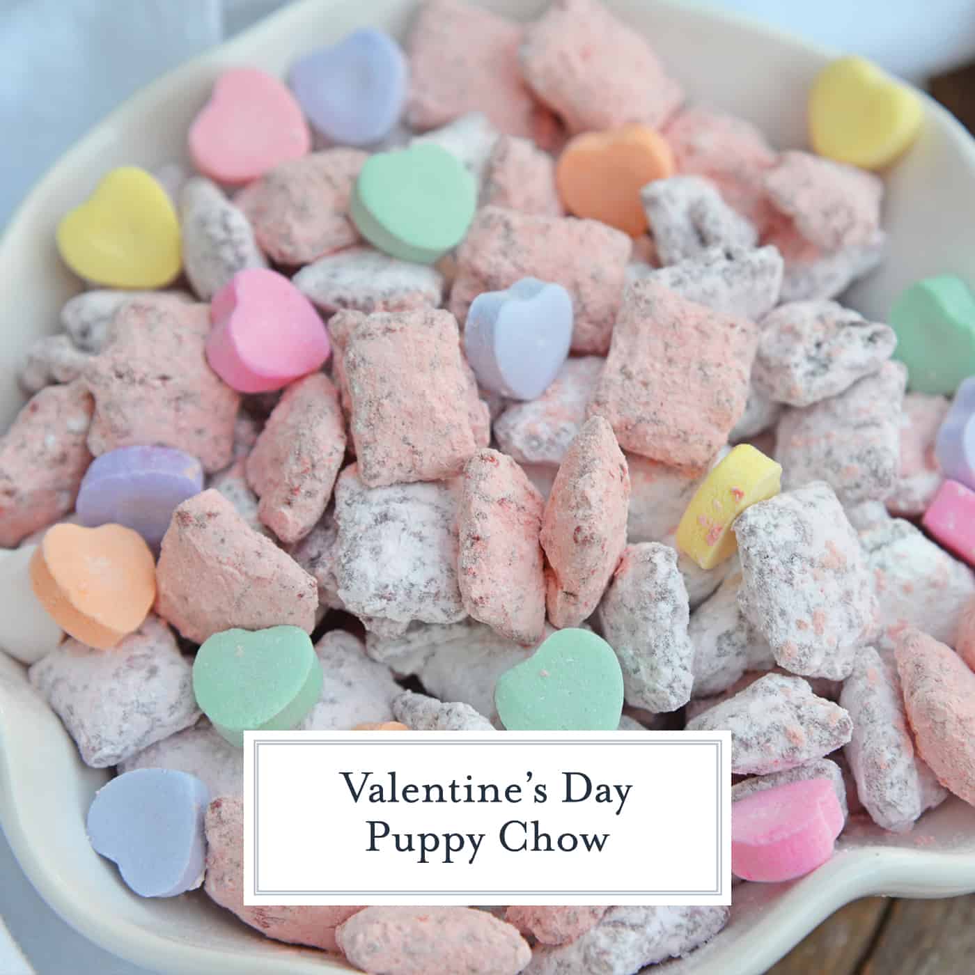 Valentine's Day Puppy Chow transforms a traditional muddy buddy recipe into a festive Cupid Crunch mix! The perfect no-bake dessert for any Valentine's Day party. #puppychow #valentinesdaydesserts #muddybuddy #nobakedesserts www.savoryexperiments.com