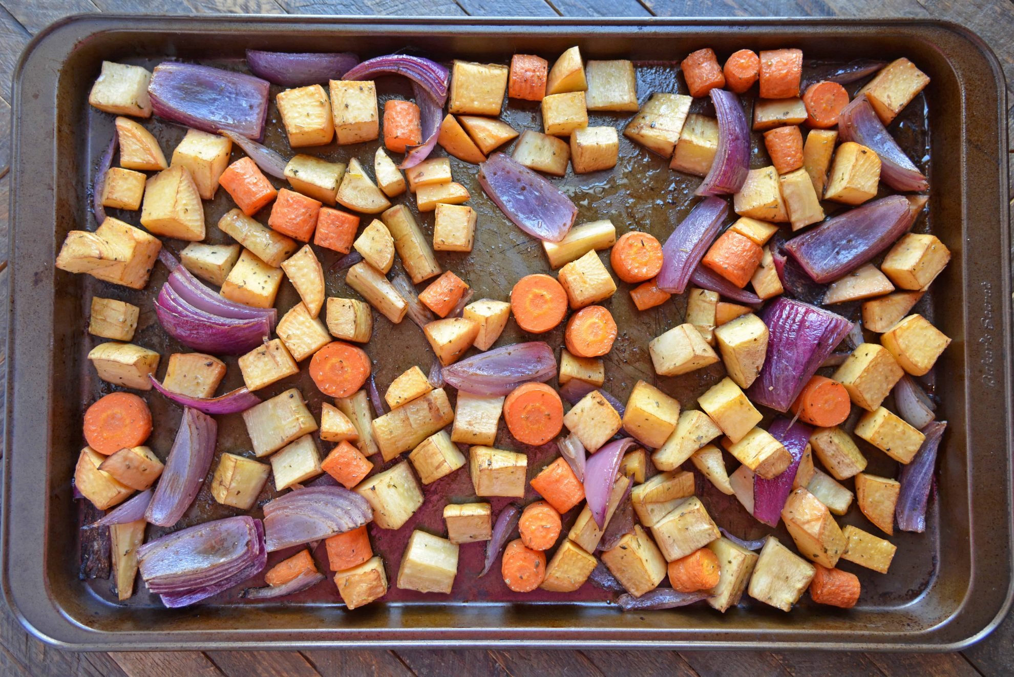 Balsamic Roasted Root Vegetables are veggies caramelized with balsamic vinegar and herbs for a crispy exterior, but smooth interior. #howtoroastvegetables #balsamicroastedrootvegetables #roastvegetables www.savoryexperiments.com 