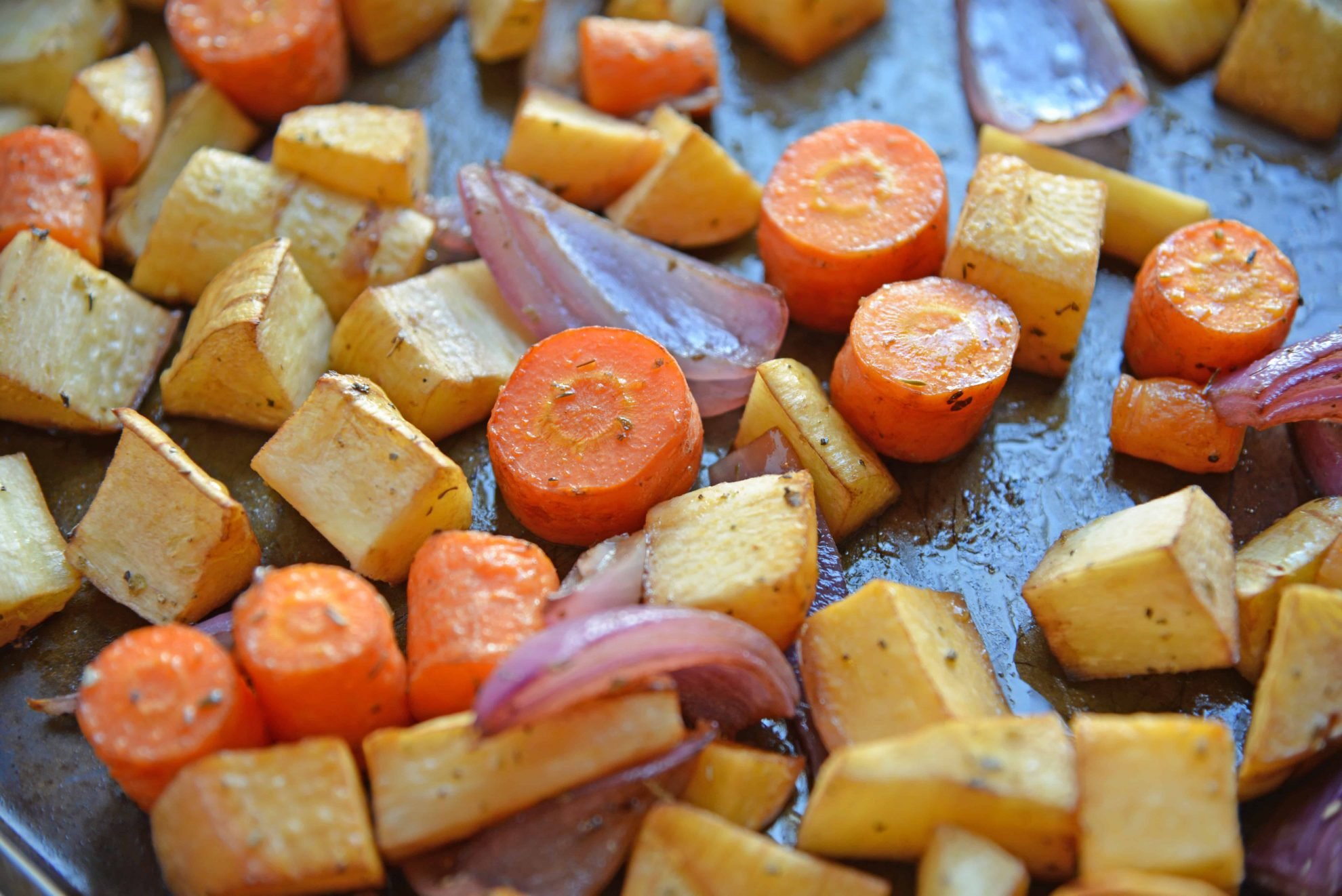 Balsamic Roasted Root Vegetables are veggies caramelized with balsamic vinegar and herbs for a crispy exterior, but smooth interior. #howtoroastvegetables #balsamicroastedrootvegetables #roastvegetables www.savoryexperiments.com 