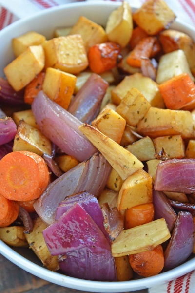 Balsamic Roasted Root Vegetables are veggies caramelized with balsamic vinegar and herbs for a crispy exterior, but smooth interior. #howtoroastvegetables #balsamicroastedrootvegetables #roastvegetables www.savoryexperiments.com