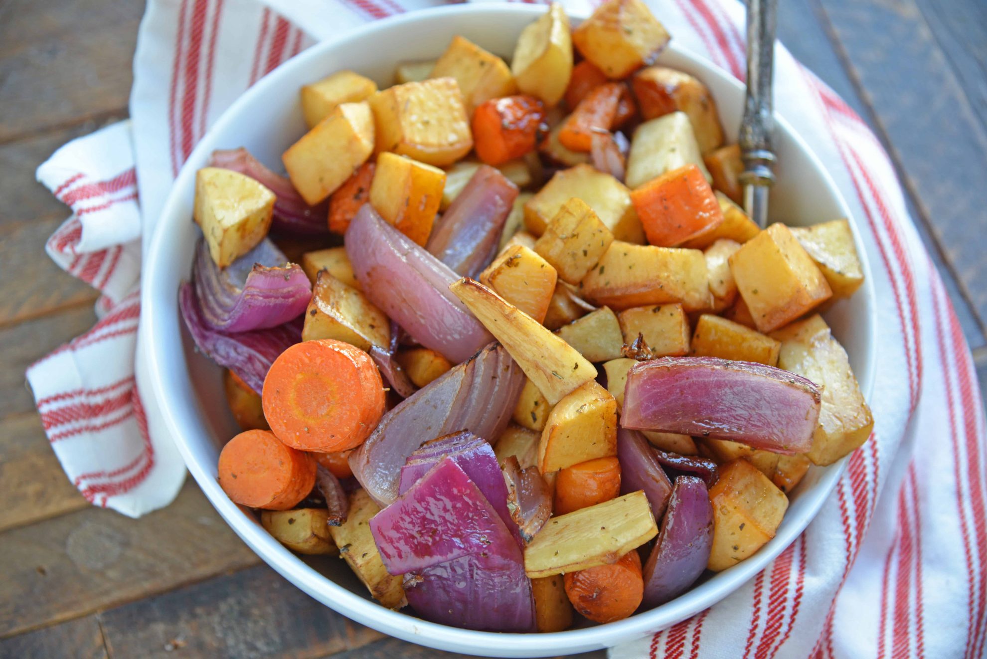 Balsamic Roasted Root Vegetables are veggies caramelized with balsamic vinegar and herbs for a crispy exterior, but smooth interior. #howtoroastvegetables #balsamicroastedrootvegetables #roastvegetables www.savoryexperiments.com