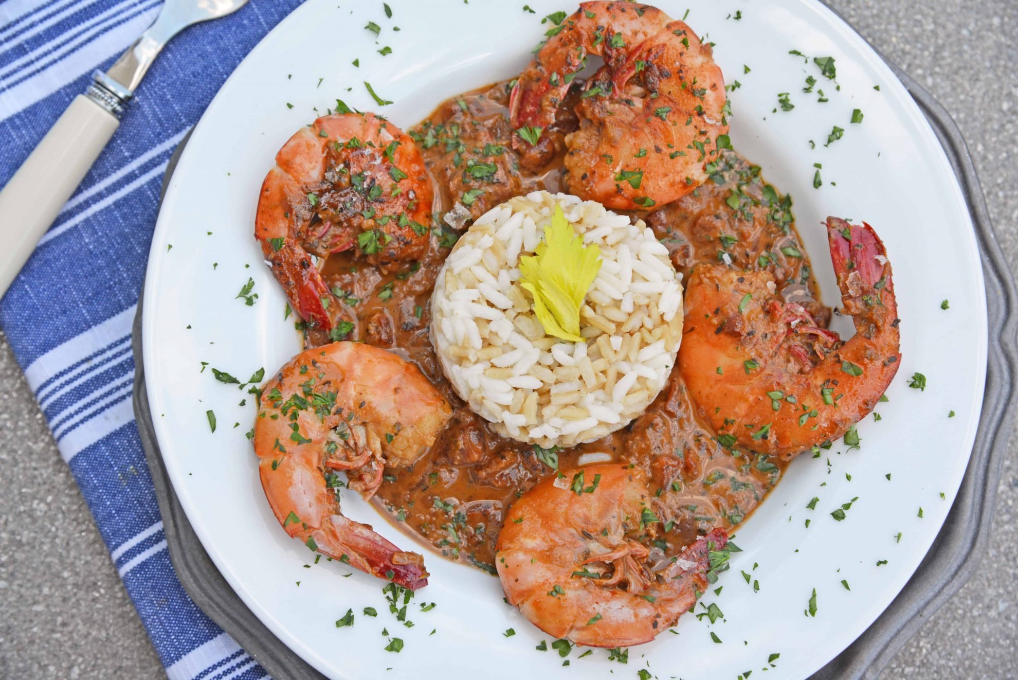 Voodoo Shrimp Creole is a tomato-based dish using shrimp and beer to make a sweet and spicy broth. Serve over rice or grits for a full meal. #voodooshrimp #shrimpcreole www.savoryexperiments.com 