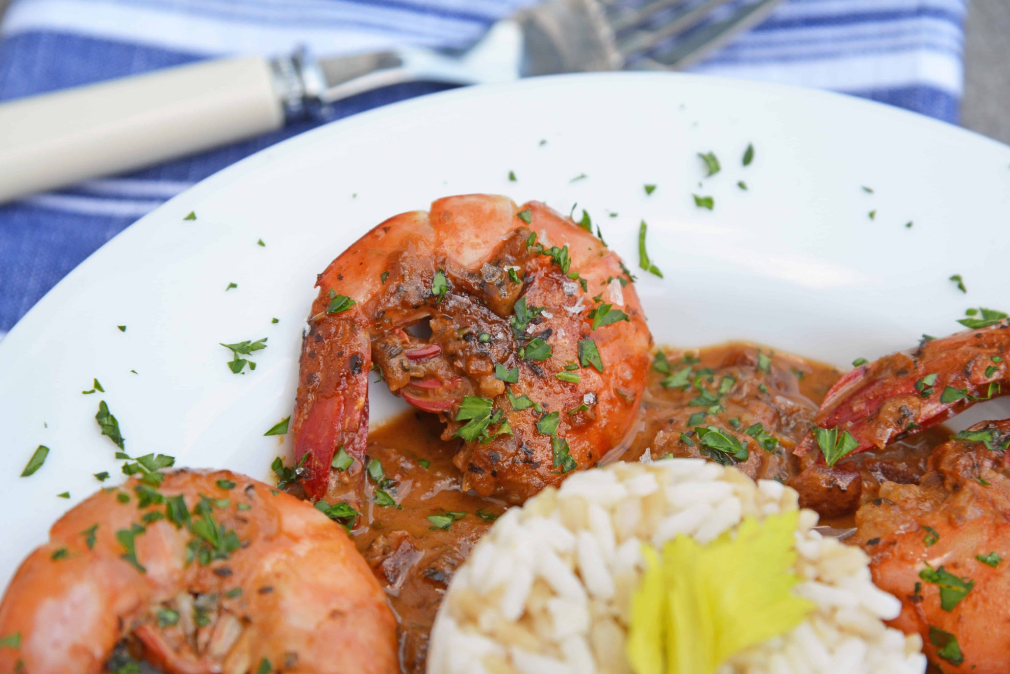 Voodoo Shrimp Creole is a tomato-based dish using shrimp and beer to make a sweet and spicy broth. Serve over rice or grits for a full meal. #voodooshrimp #shrimpcreole www.savoryexperiments.com 