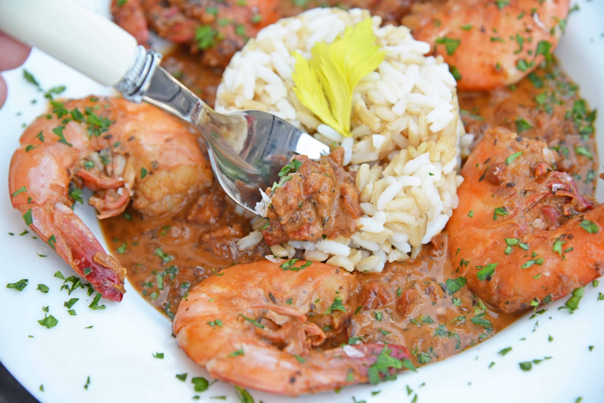 Voodoo Shrimp Creole is a tomato-based dish using shrimp and beer to make a sweet and spicy broth. Serve over rice or grits for a full meal. #voodooshrimp #shrimpcreole www.savoryexperiments.com 