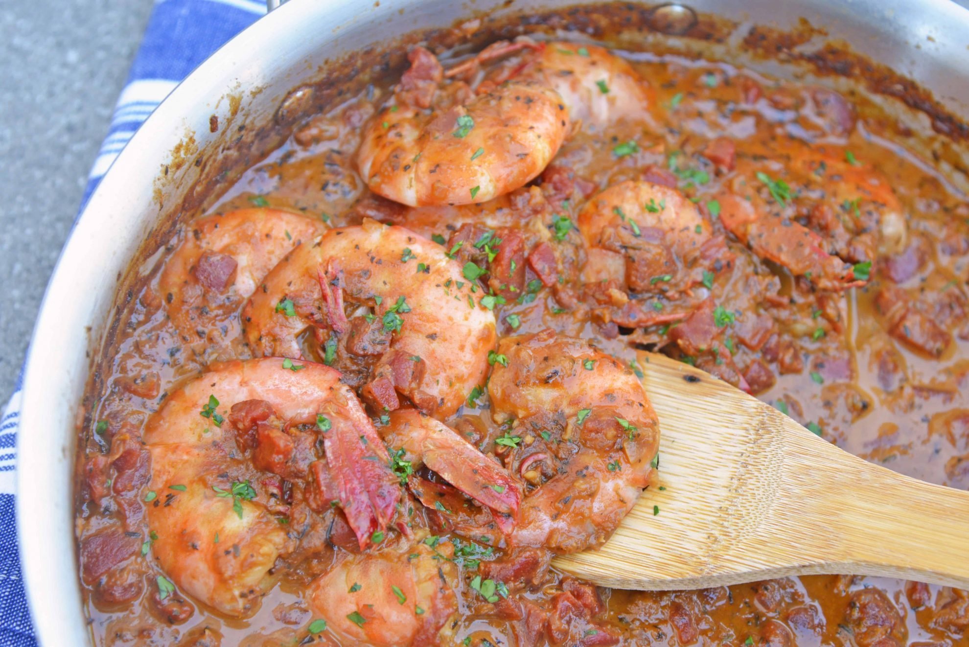 Voodoo Shrimp Creole is a tomato-based dish using shrimp and beer to make a sweet and spicy broth. Serve over rice or grits for a full meal. #voodooshrimp #shrimpcreole www.savoryexperiments.com 
