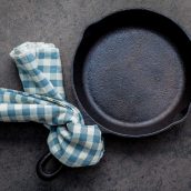 How to clean cast iron cookware in easy steps, plus how to care for and maintain cast iron to make the most of your seasoning and prevent rust! #howtocleancastiron #howtoremoverustfromcastiron www.savoryexperiments.com