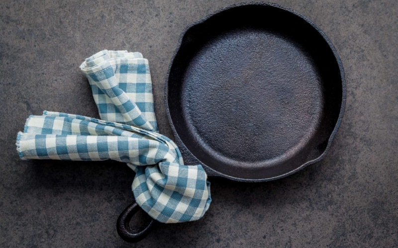 How to clean cast iron cookware in easy steps, plus how to care for and maintain cast iron to make the most of your seasoning and prevent rust! #howtocleancastiron #howtoremoverustfromcastiron www.savoryexperiments.com