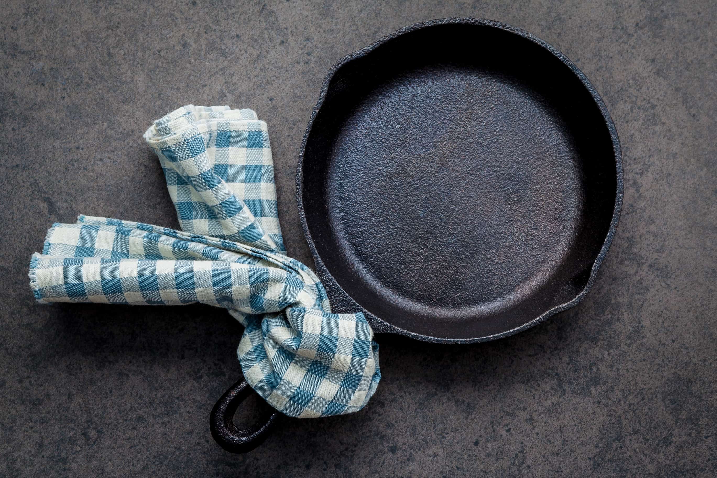 How to clean cast iron cookware in easy steps, plus how to care for and maintain cast iron to make the most of your seasoning and prevent rust! #howtocleancastiron #howtoremoverustfromcastiron www.savoryexperiments.com 