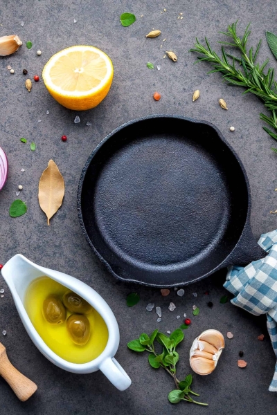 An easy guide on how to season a cast iron skillet, Dutch oven, or griddle and all your questions about how to care for cast iron answered in one spot. #howtoseasoncastiron #castironcare www.savoryexperiments.com