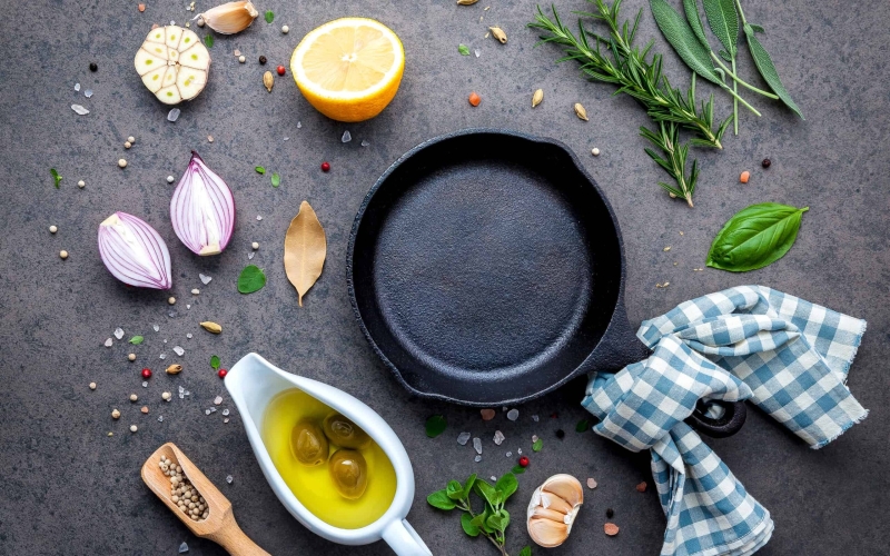 An easy guide on how to season a cast iron skillet, Dutch oven, or griddle and all your questions about how to care for cast iron answered in one spot. #howtoseasoncastiron #castironcare www.savoryexperiments.com