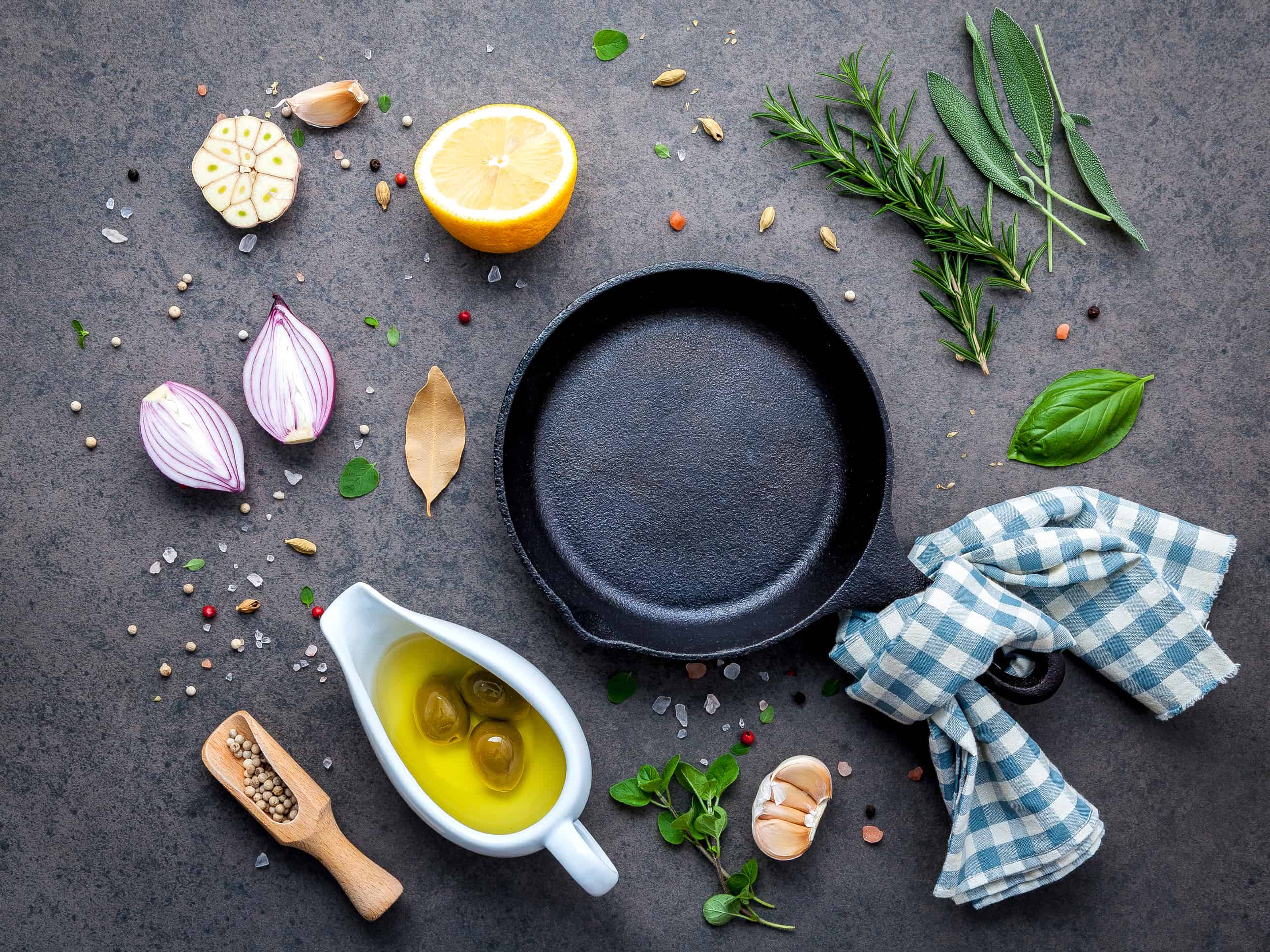 An easy guide on how to season a cast iron skillet, Dutch oven, or griddle and all your questions about how to care for cast iron answered in one spot. #howtoseasoncastiron #castironcare www.savoryexperiments.com 
