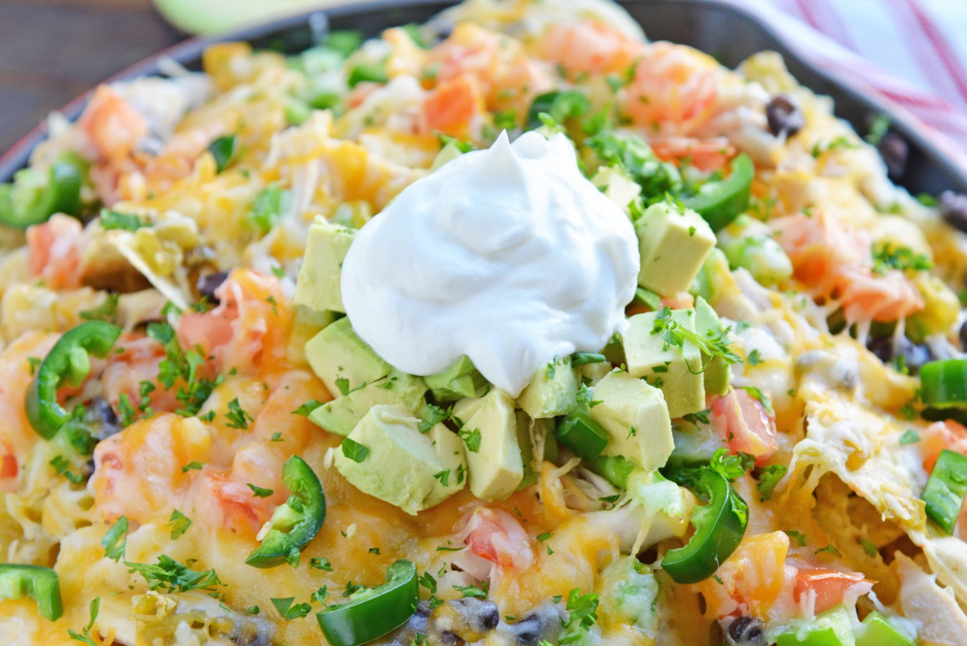 Loaded nachos with yogurt topping