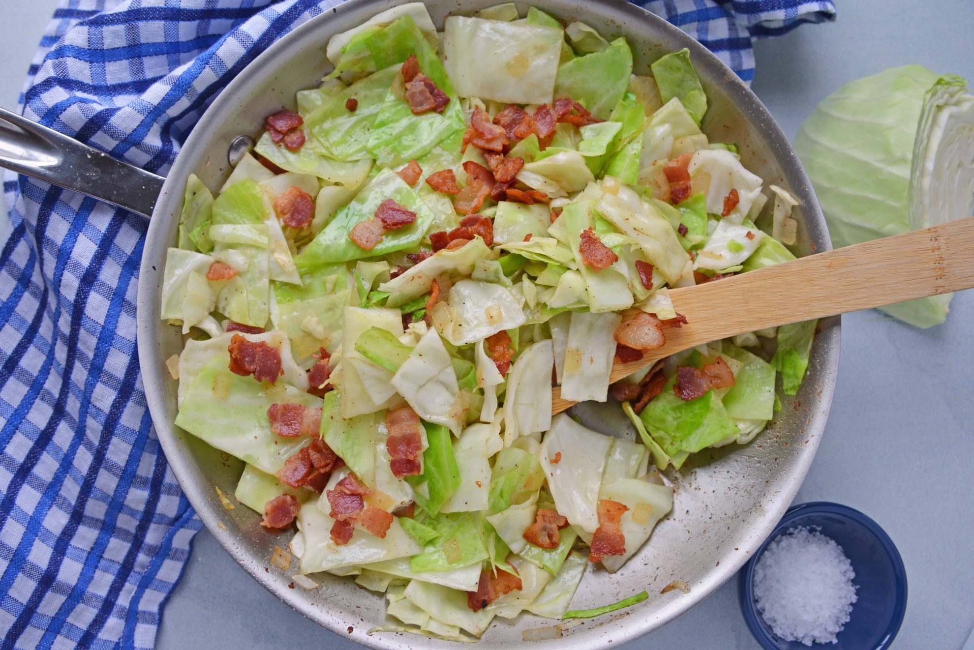 Fried Cabbage with Bacon in a Skillet