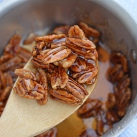 Pecan Caramel Sauce on a wooden spoon