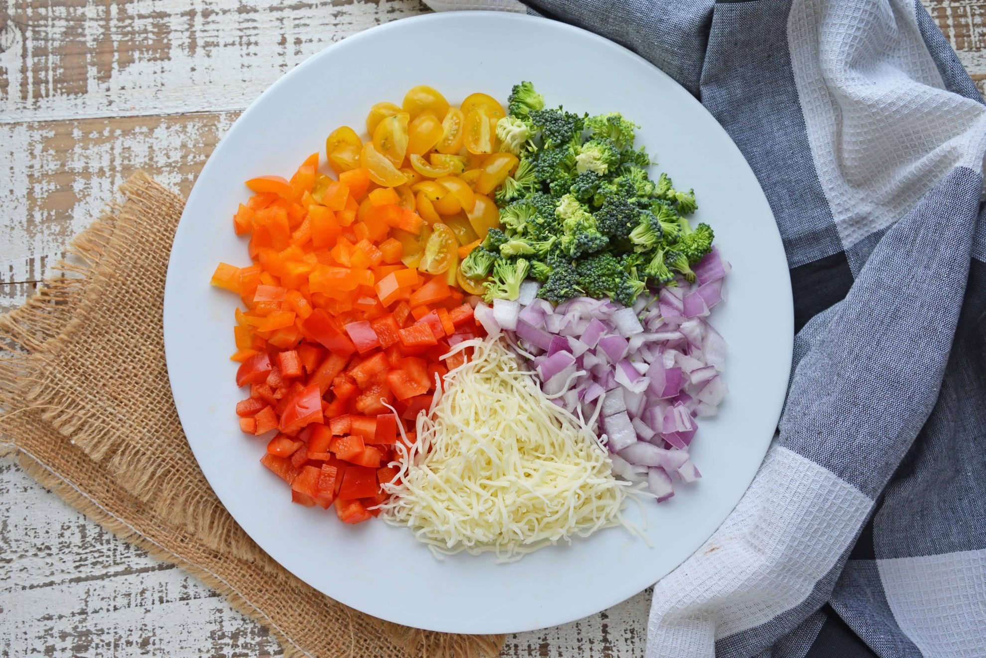 Rainbow Pizza Toppings on a White Plate