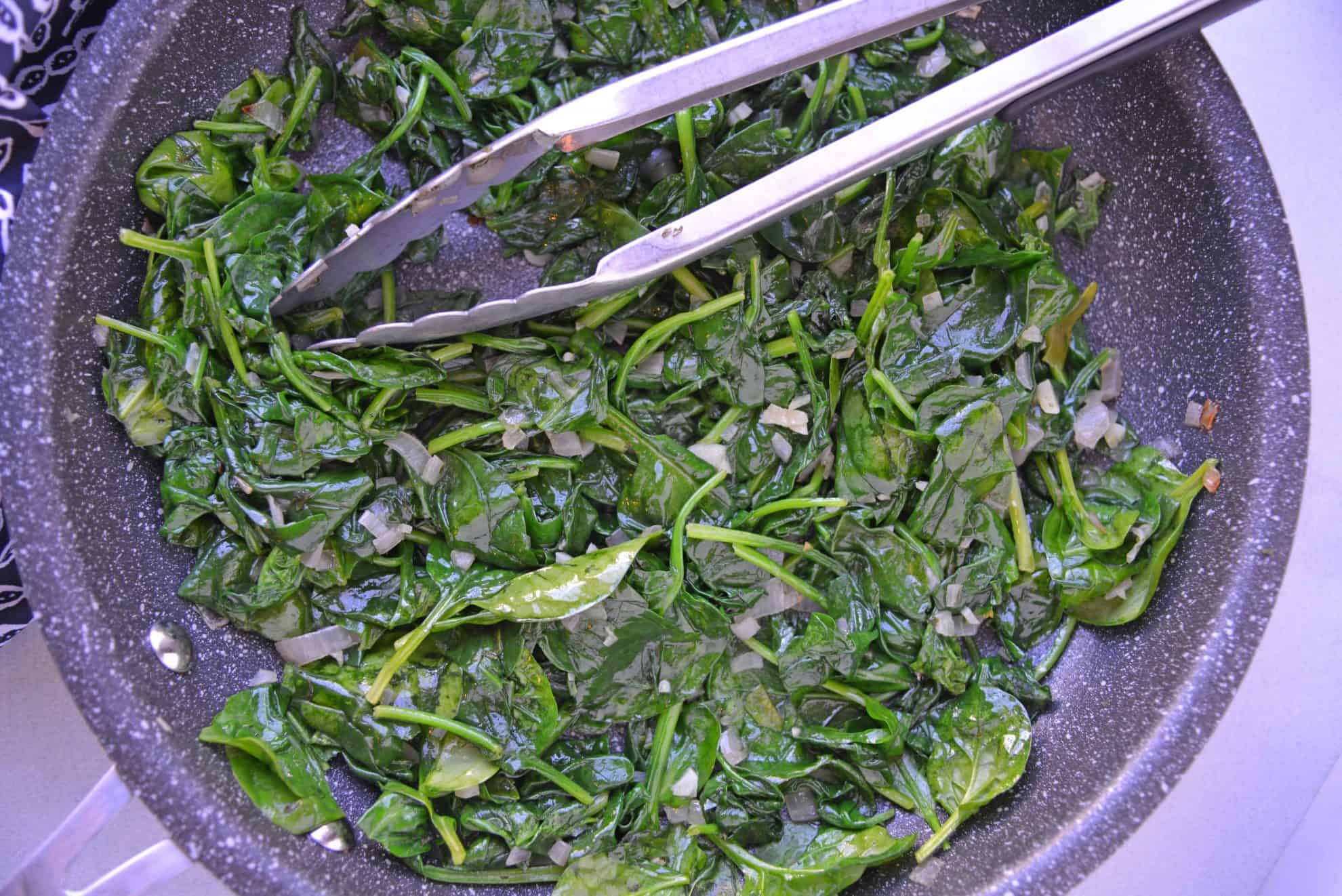 Wilted spinach in a skillet