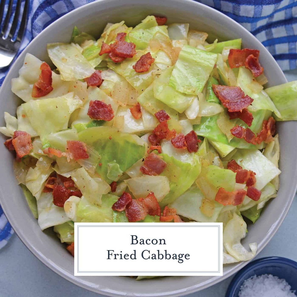 Overhead southern fried cabbage with bacon in a grey bowl