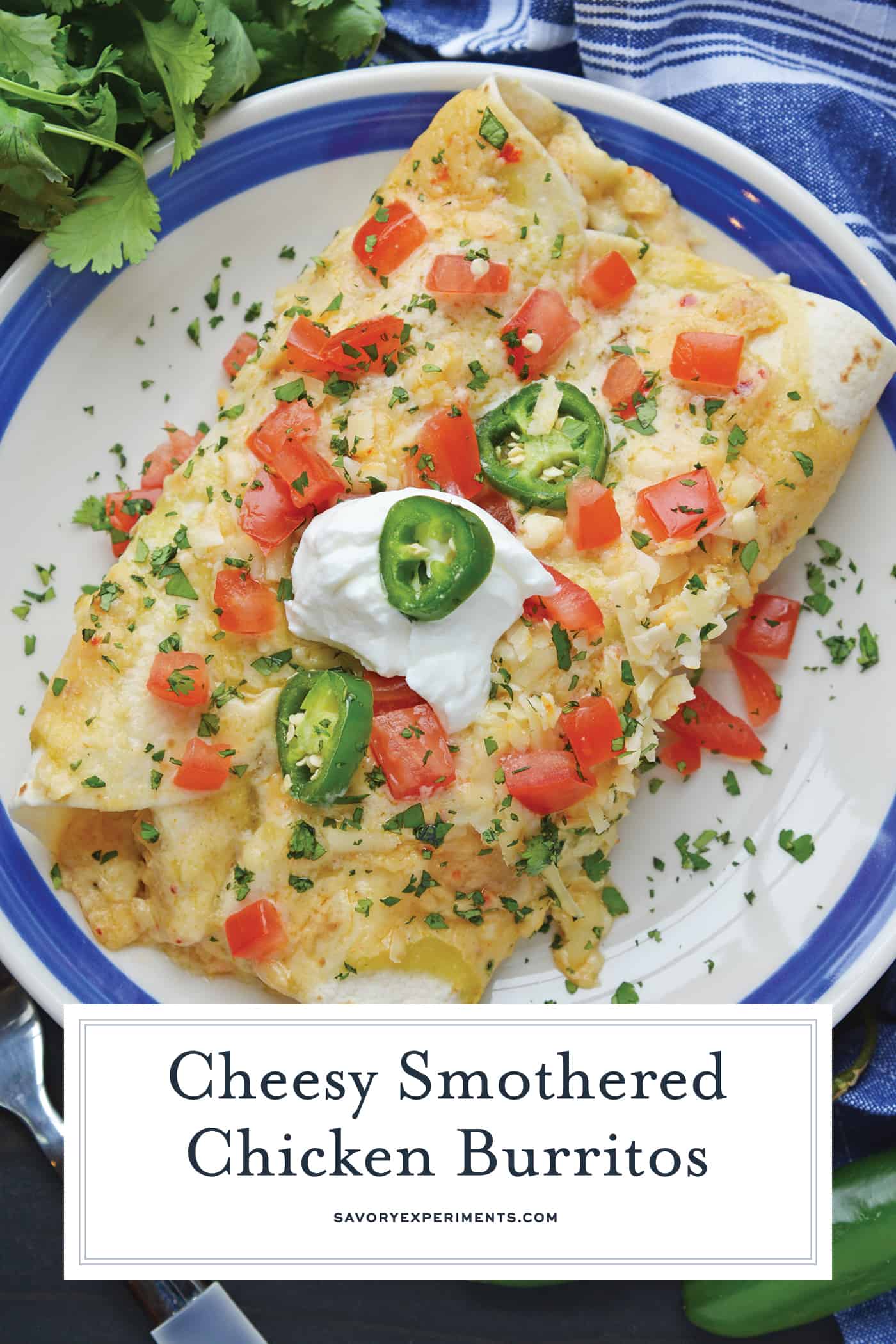 overhead shot of smothered chicken burritos with text overlay for pinterest